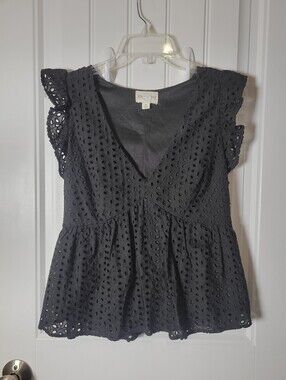 Lush Black Eyelet V-Neck Peplum Top with Flutter Sleeves by June & Ivy.  Size M